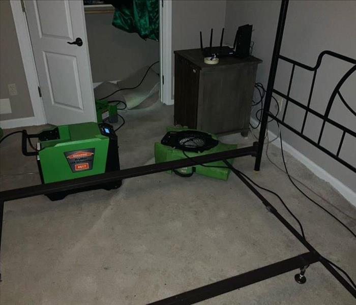 Air movers set in a bedroom