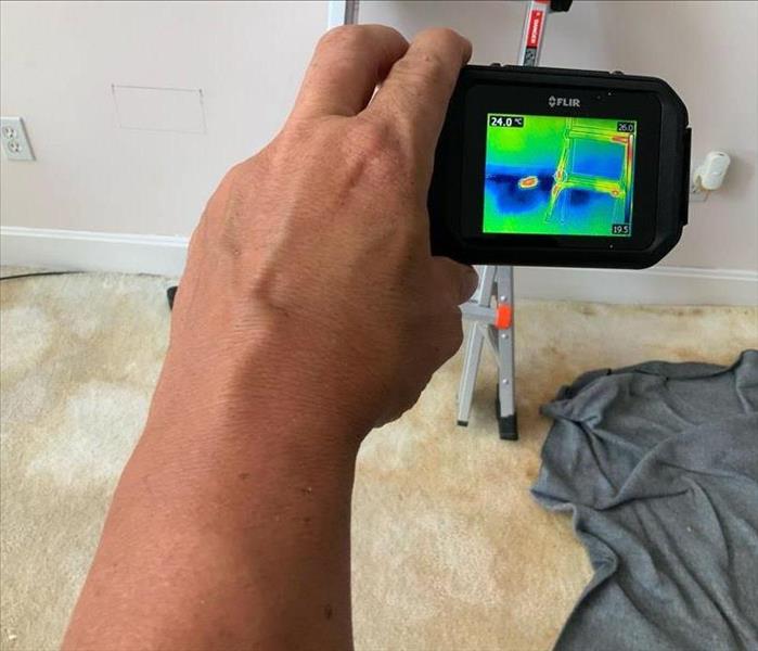 A thermal camera on a wet floor